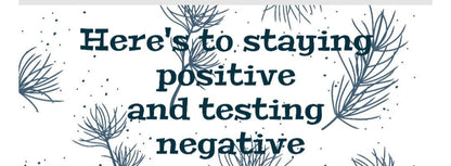 White glossy mug-"Here's to staying positive and testing negative"